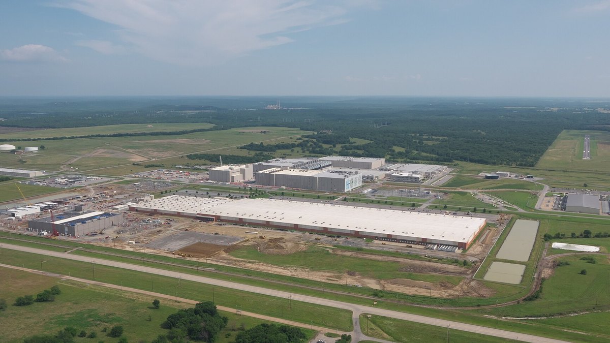 Aerial view of a large data center campus with a long white-roofed building, Mayes County, Oklahoma