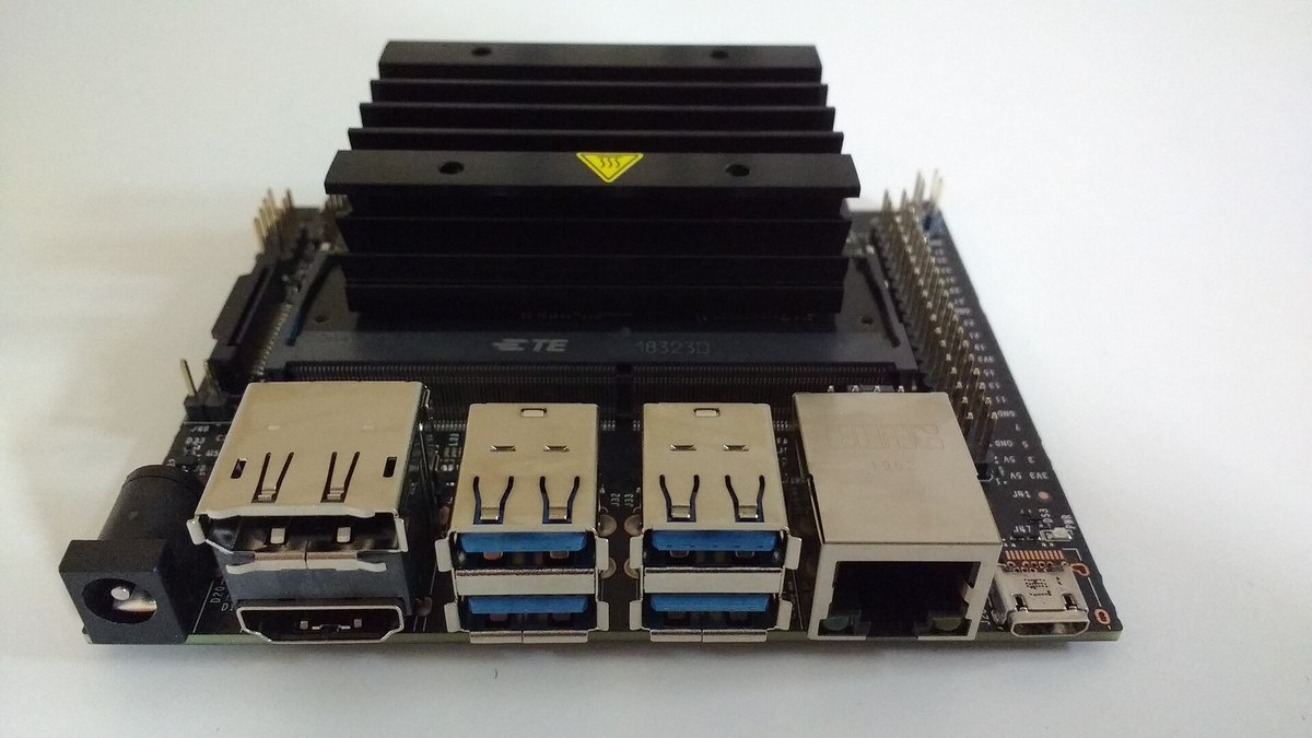 An NVIDIA Jetson Nano Developer Kit board with its heat sink, USB, HDMI and Ethernet ports