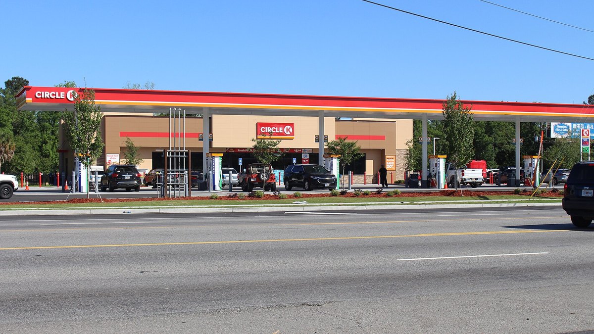 A Circle K convenience store and fuel canopy on a sunny day