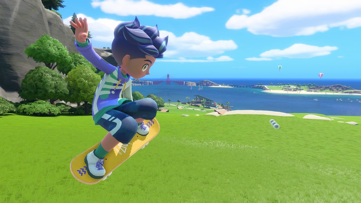 A character jumping on a skateboard over a green hillside above the sea in Nintendo Switch Sports Resort