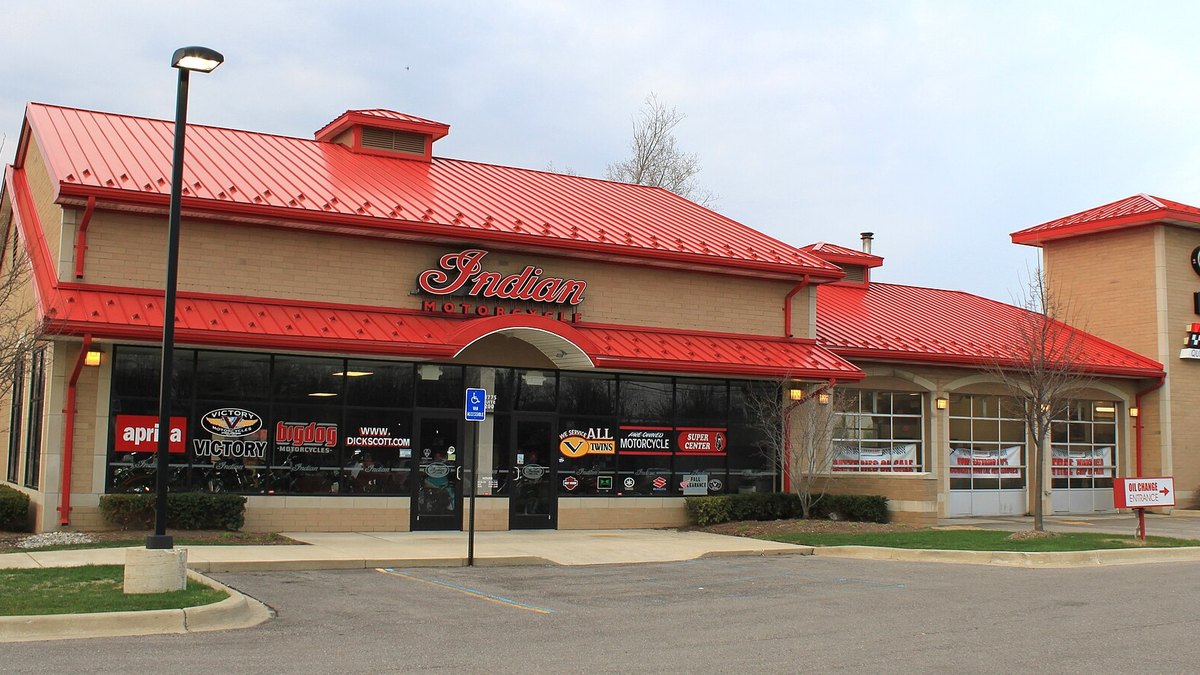 A motorcycle dealership with a showroom and service bays in Canton, Michigan