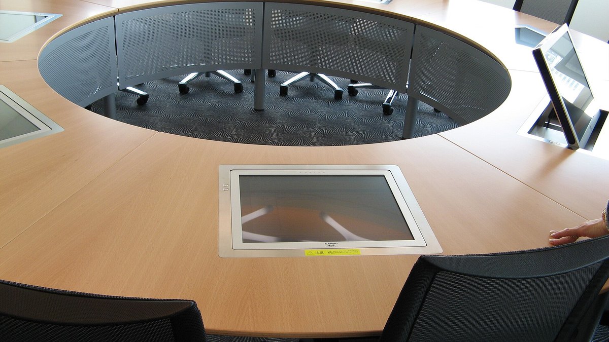 An empty round boardroom table